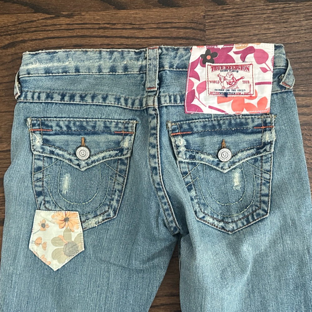 True Religion Light Blue Boot Cut Jeans with Floral Patch